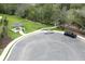 An aerial view of a community parking area with a gazebo nearby at 3031 Pilot House Pl, Oviedo, FL 32765