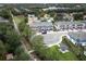 View of townhomes, community area with a gazebo, sidewalks, and mature trees in a residential neighborhood at 3031 Pilot House Pl, Oviedo, FL 32765