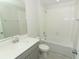 Bathroom features a bathtub, shower and neutral wall paint at 3031 Pilot House Pl, Oviedo, FL 32765