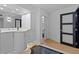 Bathroom vanity with a white countertop and open closet at 400 E Colonial Dr # 1607, Orlando, FL 32803