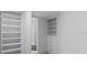 Walk-in closet with custom shelving and storage at 400 E Colonial Dr # 1607, Orlando, FL 32803