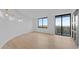 Bright living room with wood flooring and a skyline view at 400 E Colonial Dr # 1607, Orlando, FL 32803