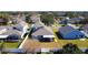 Aerial view of the home showcasing screened-in patio and fenced yard at 4012 Longworth Loop, Kissimmee, FL 34744