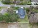 Aerial view of a single Gathering home with large trees, a screened in porch, and an above ground pool at 4200 Bear Gully Rd, Winter Park, FL 32792