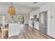 Modern kitchen featuring white cabinets and stainless steel appliances at 4520 Lake Gem Cir, Orlando, FL 32806