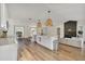 Modern island kitchen with a black faucet and stylish pendant lighting at 4520 Lake Gem Cir, Orlando, FL 32806