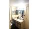 Bathroom featuring a vanity with plenty of counterspace and ample storage at 4944 Sanoma Vlg # D, Orlando, FL 32808