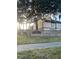 Exterior of the Acorn Village community with mature trees and lush landscaping at 4944 Sanoma Vlg # D, Orlando, FL 32808