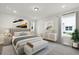 Beautifully staged main bedroom with neutral tones, curtains, and tasteful decorations at 501 Dean Creek Ln, Orlando, FL 32825