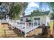 A beautiful deck with outdoor furniture, perfect for entertaining and enjoying the view at 516 8Th St, Orlando, FL 32820