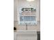 Sunlit kitchen with a farmhouse sink, subway tile backsplash, and modern fixtures at 516 8Th St, Orlando, FL 32820