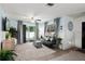 Inviting living room with neutral tones, stylish curtains, and sliding doors leading to an outdoor deck at 516 8Th St, Orlando, FL 32820