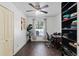 Bright office space with wood floors, desk, open closet, and a large window providing natural light at 516 8Th St, Orlando, FL 32820