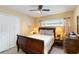 Relaxing bedroom with a cozy bed, side tables, and plush pillows at 5359 Lanyard Ct, Winter Park, FL 32792