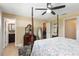 View of the bedroom leading to the en suite bathroom and walk-in closet at 5359 Lanyard Ct, Winter Park, FL 32792