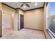 Neutral bedroom featuring crown moulding, a large window and connecting bathroom at 642 Osprey Lakes Cir, Chuluota, FL 32766