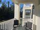 Charming balcony with seating, offering a relaxing outdoor space to enjoy scenic views at 770 Siena Palm Dr # 201, Kissimmee, FL 34747