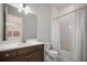 Bathroom features a shower/tub combination, sleek vanity, and contemporary lighting at 8125 Via Vittoria Way, Orlando, FL 32819