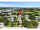 Aerial view of property, highlighting the surrounding neighborhood and landscaping at 932 Classic View Dr, Auburndale, FL 33823