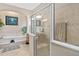 Beautiful bathroom with a separate shower, soaking tub, and neutral color scheme at 932 Classic View Dr, Auburndale, FL 33823