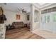 Living room featuring a fan, hardwood floors, an entryway and plenty of space at 932 Classic View Dr, Auburndale, FL 33823