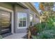 Inviting front entrance with modern door and lush landscaping and stone walkway at 1311 Travertine Ter, Sanford, FL 32771