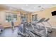 Community gym with treadmills, ellipticals, weights, and fans for a complete workout experience at 1311 Travertine Ter, Sanford, FL 32771