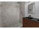 Modern shower with unique tilework and black hardware at 1407 Dunsany Ave, Orlando, FL 32806