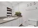 Bathroom featuring a white vanity with a plant and some towels at 142 Villa Di Este Ter # 204, Lake Mary, FL 32746