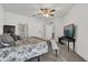 Bedroom with carpet, ceiling fan, and a television at 142 Villa Di Este Ter # 204, Lake Mary, FL 32746