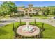 Beautiful community center with fountain, landscaping, and elegant architecture at 142 Villa Di Este Ter # 204, Lake Mary, FL 32746