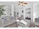 Living room featuring lots of sunlight, neutral colors, ceiling fan, and open floor plan at 142 Villa Di Este Ter # 204, Lake Mary, FL 32746