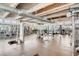An expansive gym equipped with various machines and weights, offering a full range of fitness options at 150 E Robinson St # 1214, Orlando, FL 32801