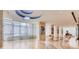 Spacious lobby with high ceilings, marble floors, and elegant seating areas with modern decor at 150 E Robinson St # 1214, Orlando, FL 32801