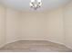 Formal dining room with modern flooring and a stylish chandelier at 15174 Evergreen Oak, Winter Garden, FL 34787