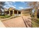 Charming single-Gathering home with a brick driveway, inviting porch, and well-maintained landscaping at 15174 Evergreen Oak, Winter Garden, FL 34787