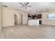 Bright living room features modern flooring, neutral paint and an open floor plan at 15174 Evergreen Oak, Winter Garden, FL 34787