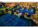 Aerial view of community sports facilities, including tennis and basketball courts at 15174 Evergreen Oak, Winter Garden, FL 34787