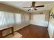 Bright living room with wood floors, natural light and decorative nautical items at 1522 S Shore Dr, Tavares, FL 32778