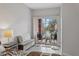Relaxing balcony features seating and peaceful views of the surrounding neighborhood and pond at 167 Villa Di Este Ter Ter # 213, Lake Mary, FL 32746