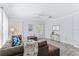 Cozy living room with a plush sectional sofa, soft rug, and natural light at 167 Villa Di Este Ter Ter # 213, Lake Mary, FL 32746