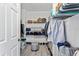 Spacious walk-in closet with organized shelving and ample storage for clothes and accessories at 167 Villa Di Este Ter Ter # 213, Lake Mary, FL 32746