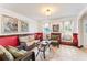 Comfortable living room with tile floors, natural lighting, and stylish decor at 1709 Palm Beach Dr, Apopka, FL 32712