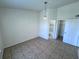 Bedroom with tile flooring, closet, neutral walls and ensuite bathroom at 1932 Lake Atriums Cir # 85, Orlando, FL 32839