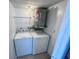 Laundry room with a standard-size washer and dryer and overhead lighting at 1932 Lake Atriums Cir # 85, Orlando, FL 32839