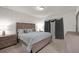 Cozy bedroom with soft lighting, neutral walls, and comfortable bed, creating a relaxing atmosphere at 2234 Bluebird Pl, St Cloud, FL 34771
