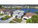 Scenic aerial view of a residential neighborhood with a beautiful lake view at 2263 Mallard Creek Cir, Kissimmee, FL 34743