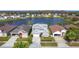 Scenic aerial view of a residential neighborhood and the lake at 2263 Mallard Creek Cir, Kissimmee, FL 34743