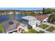 Scenic aerial view of a residential neighborhood and the lake at 2263 Mallard Creek Cir, Kissimmee, FL 34743