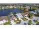 Scenic aerial view of a residential neighborhood and the lake at 2263 Mallard Creek Cir, Kissimmee, FL 34743